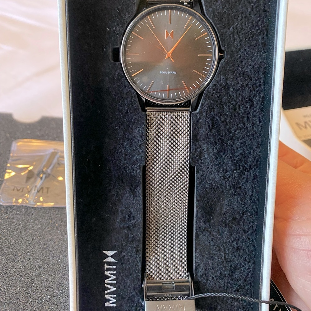 Lincoln MVMT watch. Gun metal and rose gold. Never warn with tags attached.